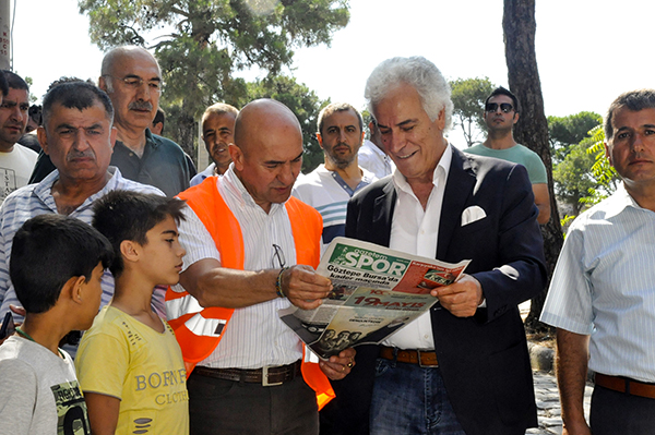 ELLERİYLE TEMİZLEYİP,  TELEFERİK MÜJDESİNİ TEKRARLADI