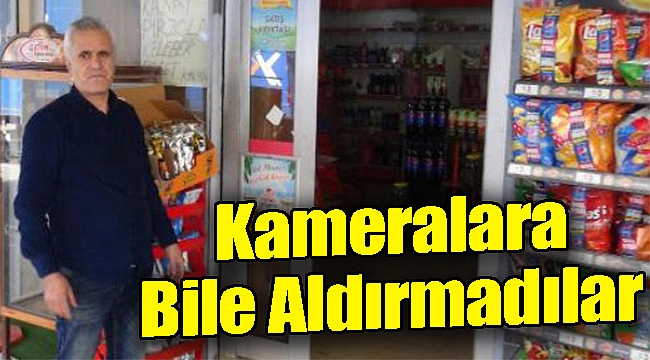 İzmir'de soygun: Kameralara bile aldırmadılar