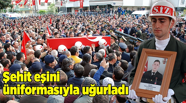 Şehit eşini üniformasıyla uğurladı