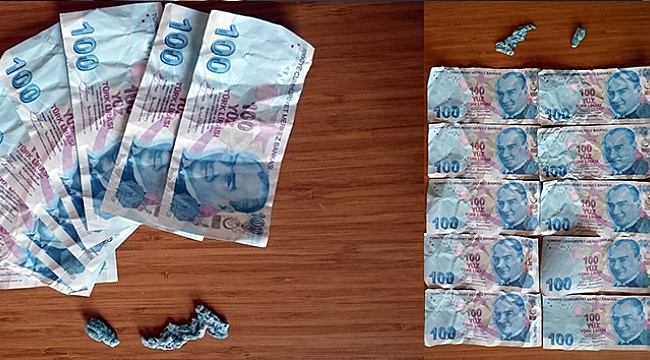 Polisi görünce sahte parayı yutmak istedi