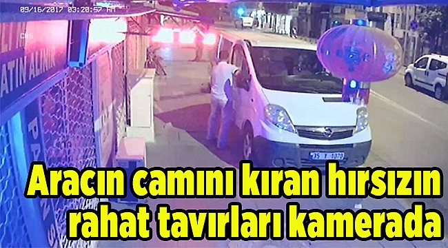 Aracın camını kıran hırsızın rahat tavırları kamerada