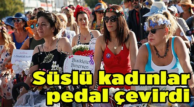 Süslü kadınlar pedal çevirdi