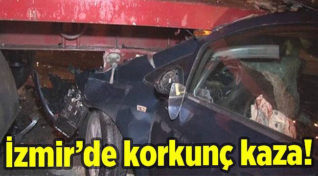 İzmir'de otomobil TIR dorsesine çarptı