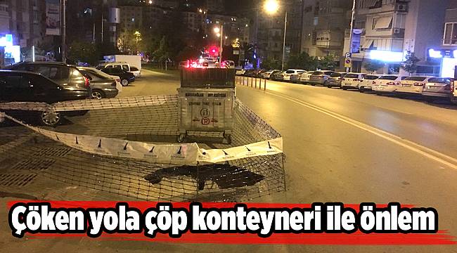 Çöken yola çöp konteyneri ile önlem