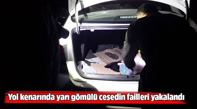 Yol kenarında yarı gömülü cesedin failleri yakalandı