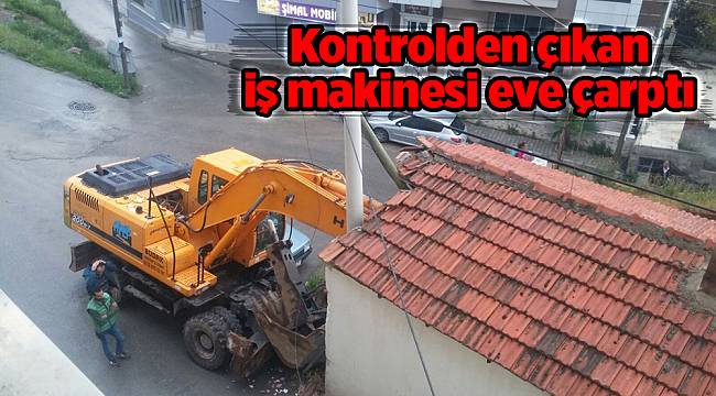 Kontrolden çıkan iş makinesi eve çarptı