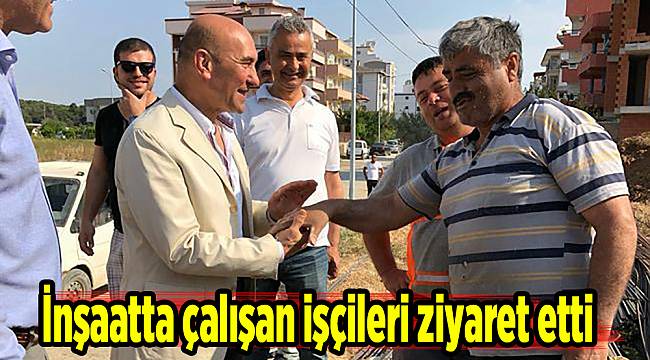İnşaatta çalışan işçileri ziyaret etti