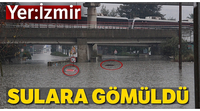 İzmir'de yoğun yağış aracı suya gömdü