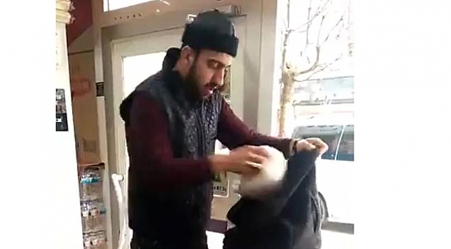 Poşete para vermemek için montunu poşet yaptı