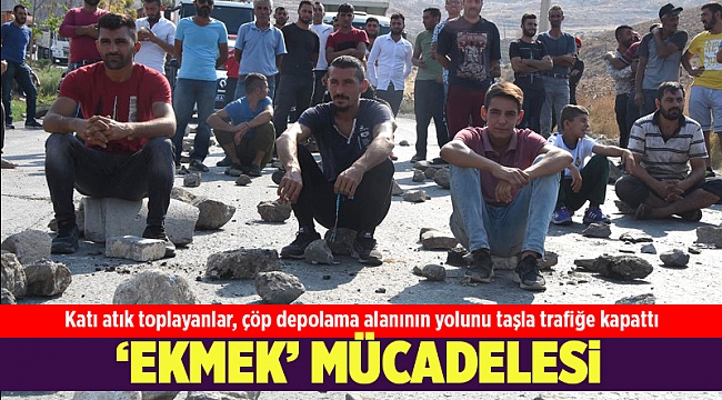 Katı atık toplayanlar, çöp depolama alanının yolunu taşla trafiğe kapattı