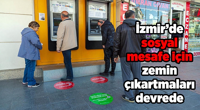 İzmir’de sosyal mesafe için zemin çıkartmaları devrede