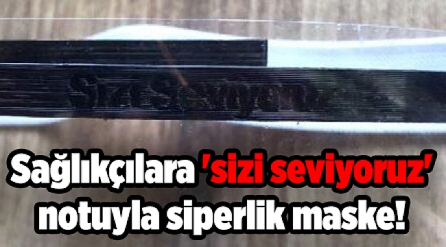 Sağlıkçılara 'sizi seviyoruz' notuyla siperlik maske!