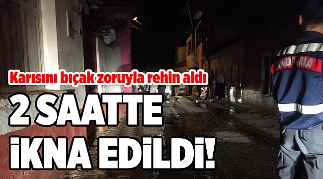 Korku dolu anlar: Karısını bıçak zoruyla rehin aldı