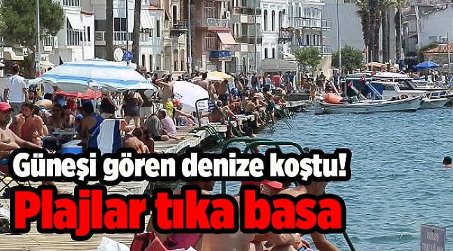 Güneşi gören denize koştu! Plajlar tıka basa