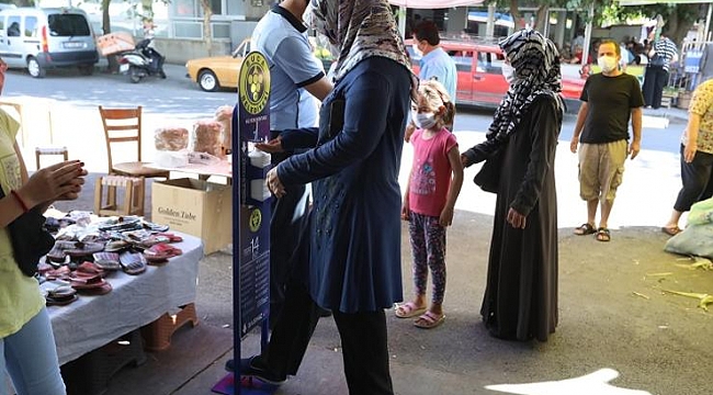 Buca pazarlarında dezenfektanlı önlem