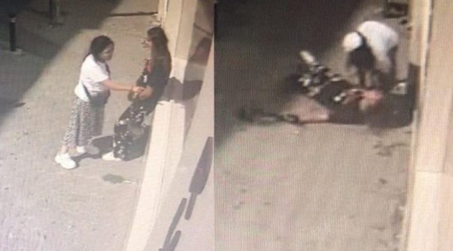 Arkadaşını sokak ortasında yere yatırıp kafasını kaldırma vurdu