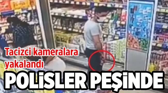 Markette kadının fotoğrafını çeken tacizci güvenlik kameralarına yakalandı