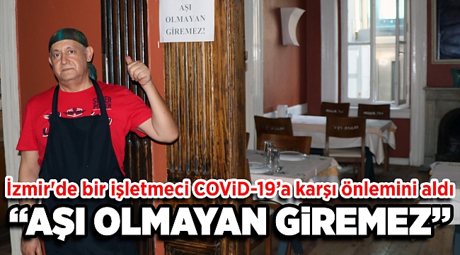 İzmir'de bir işletmeci iş yerine "Aşı olmayan giremez" yazısı astı