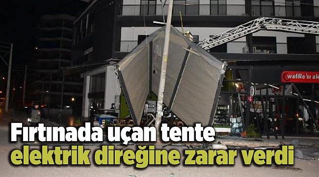 Fırtınada uçan tente elektrik direğine zarar verdi