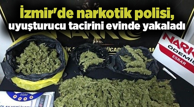 İzmir&#039;de narkotik polisi, uyuşturucu tacirini evinde yakaladı