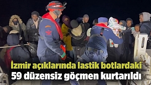İzmir açıklarında lastik botlardaki 59 düzensiz göçmen kurtarıldı