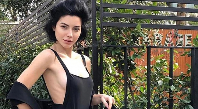 Merve Boluğur başını örtüp göbeğini açtı!