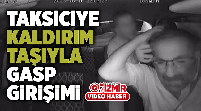Taksiciye kaldırım taşı ile gasp girişimi