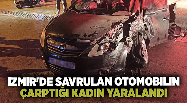 İzmir&#039;de savrulan otomobilin çarptığı kadın yaralandı