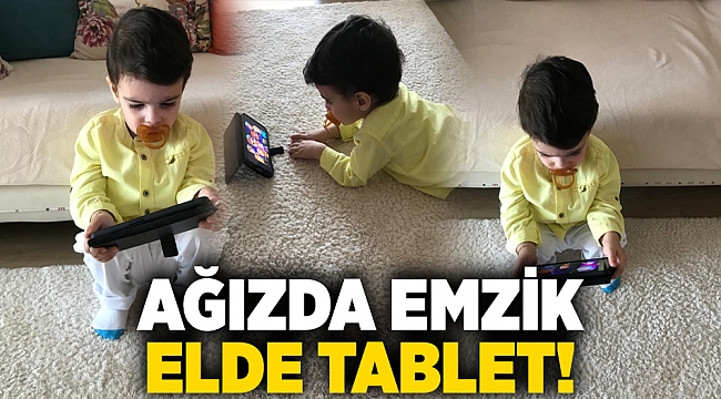 "Ağzında emzik, elinde tablet"