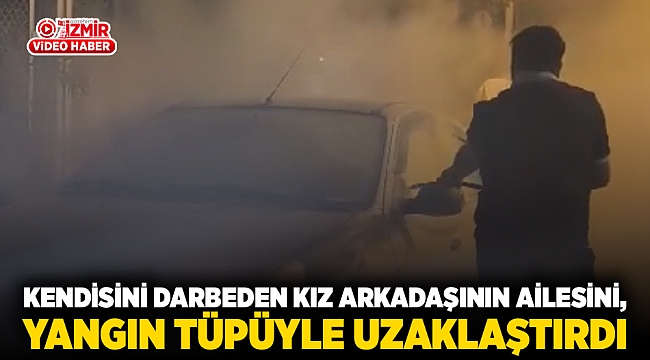 Kendisini darbeden kız arkadaşının ailesini,  yangın tüpüyle uzaklaştırdı