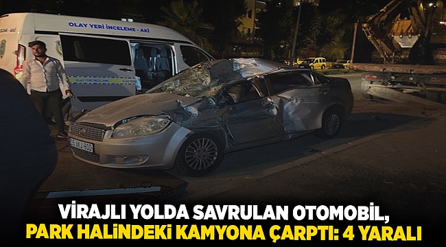 Virajlı yolda savrulan otomobil, park halindeki kamyona çarptı: 4 yaralı