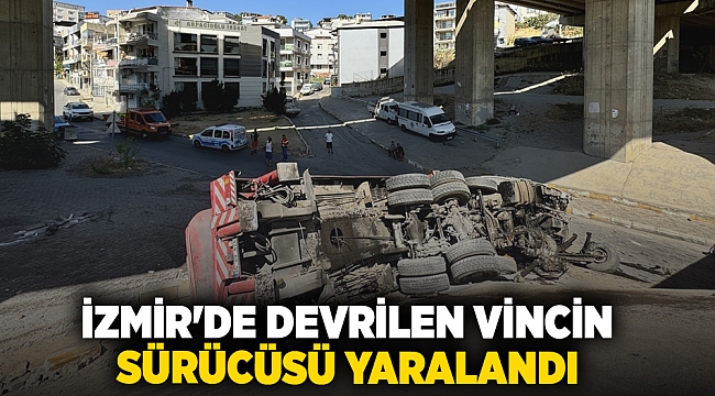 İzmir&#039;de devrilen vincin sürücüsü yaralandı