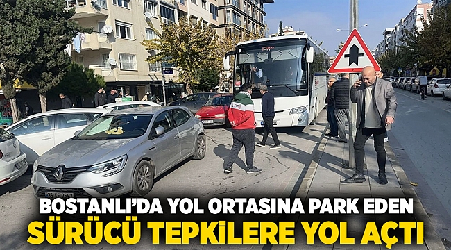 Bostanlı&#039;da yol ortasına park eden sürücü tepkilere yol açtı