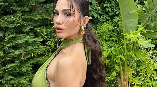 Demet Özdemir havuzda güneş banyosu yaptı