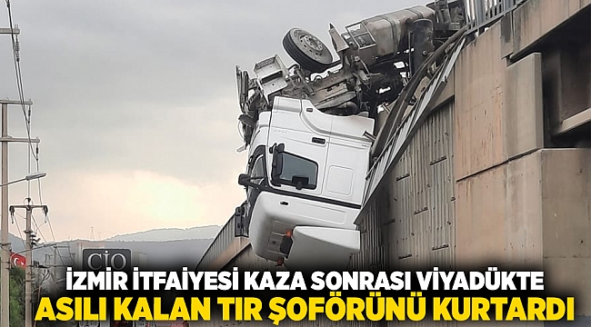 İzmir İtfaiyesi kaza sonrası viyadükte asılı kalan tır şoförünü kurtardı