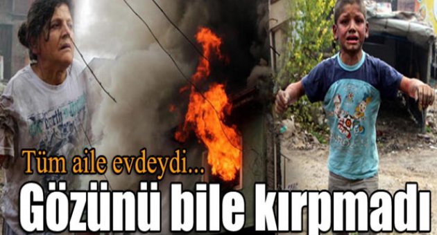 Alevlerin arasından oğlunu kurtardı