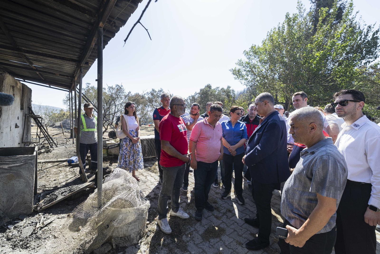 Başkan Tugay yangından etkilenen vatandaşları ziyaret etti